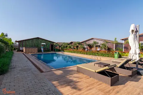 Outdoor pool with loungers