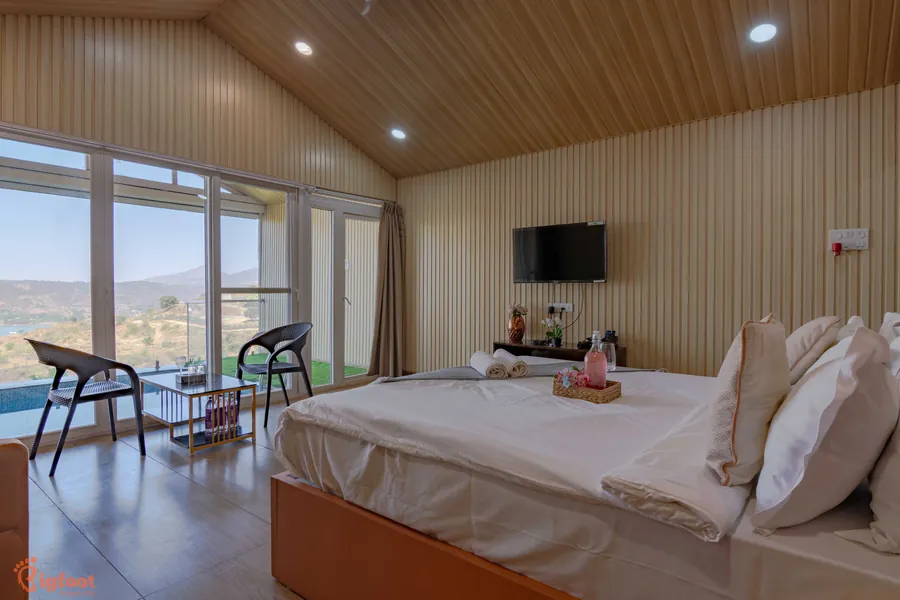 Cottage living space with valley-view sliding doors